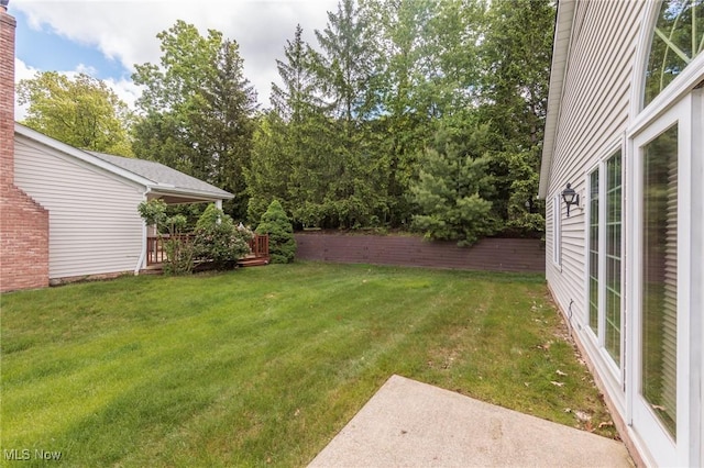 14250 Reserve Ln, Middleburg Heights, OH 44130 - view of yard with a patio and a deck