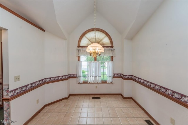 14250 Reserve Ln, Middleburg Heights, OH 44130 - unfurnished dining area featuring a chandelier, lofted ceiling, and light tile patterned floors
