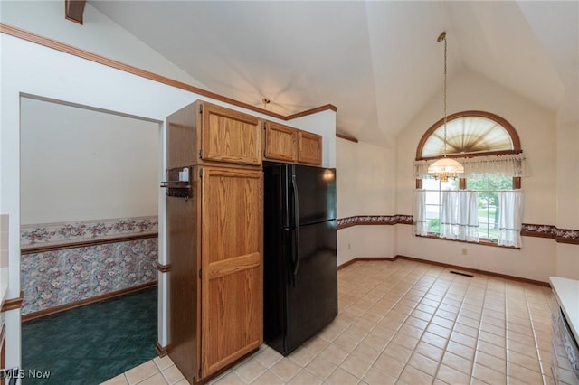14250 Reserve Ln, Middleburg Heights, OH 44130 - kitchen featuring freestanding refrigerator, light tile patterned flooring, baseboards, and high vaulted ceiling