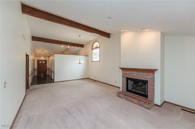 14250 Reserve Ln, Middleburg Heights, OH 44130 - unfurnished living room featuring a brick fireplace, a chandelier, carpet, and baseboards