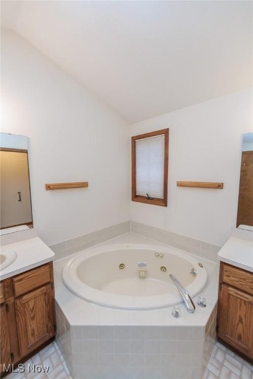 14250 Reserve Ln, Middleburg Heights, OH 44130 - full bath featuring vanity and a whirlpool tub