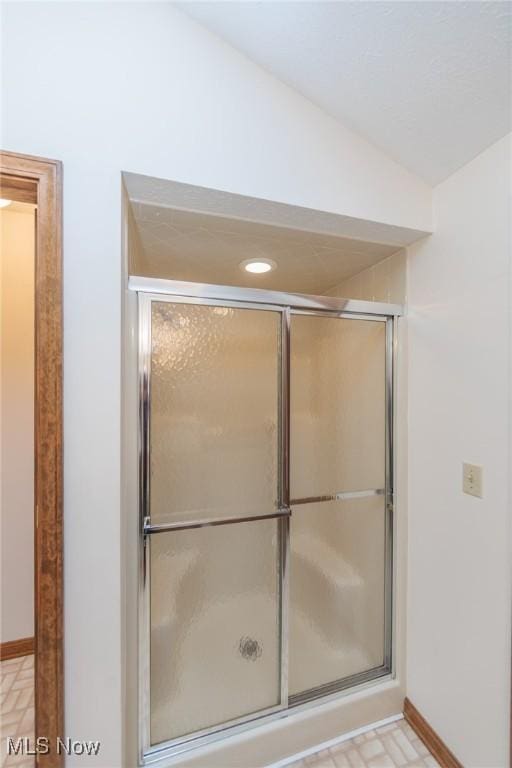 14250 Reserve Ln, Middleburg Heights, OH 44130 - full bathroom featuring baseboards, a shower with shower door, and recessed lighting