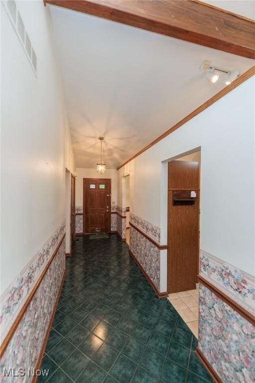 14250 Reserve Ln, Middleburg Heights, OH 44130 - hall featuring a wainscoted wall and ornamental molding