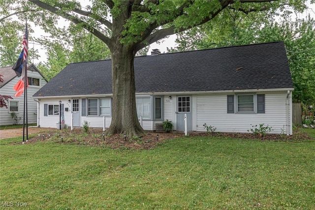 524 Irving Park Blvd, Sheffield Lake, OH 44054 - cape cod home with a front yard and a shingled roof