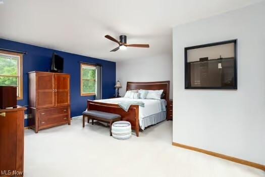 1339 Harmony Dr, Wadsworth, OH 44281 - bedroom featuring carpet floors, multiple windows, and ceiling fan