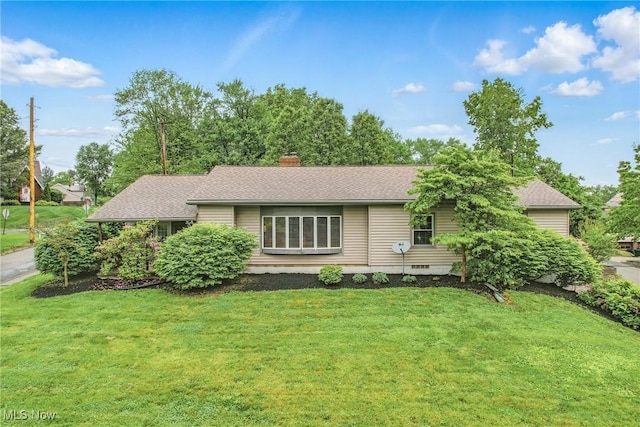 298 W Chestnut St, Lisbon, OH 44432 - ranch-style home with a front yard, a chimney, a shingled roof, and crawl space