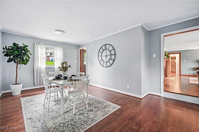 298 W Chestnut St, Lisbon, OH 44432 - dining area featuring crown molding, dark wood finished floors, and baseboards