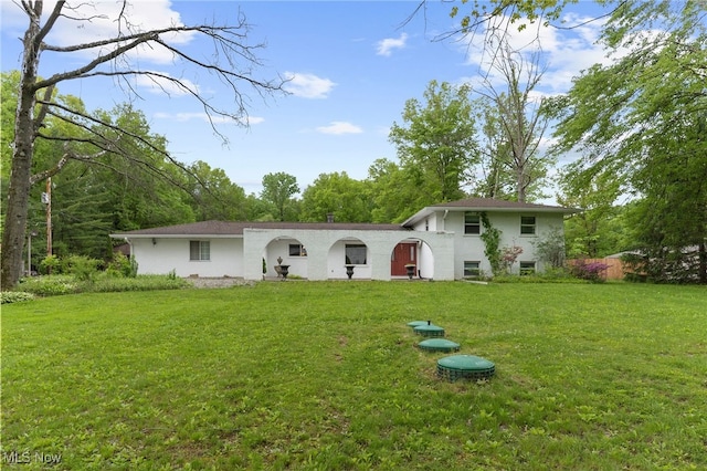 17801 Ellsworth Rd, Lake Milton, OH 44429 - view of front of property with a front yard and stucco siding