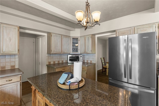 17801 Ellsworth Rd, Lake Milton, OH 44429 - kitchen featuring stainless steel appliances, a chandelier, backsplash, and glass insert cabinets