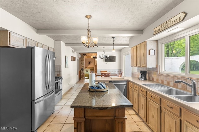 17801 Ellsworth Rd, Lake Milton, OH 44429 - kitchen with stainless steel appliances, light tile patterned flooring, a chandelier, beamed ceiling, and decorative backsplash