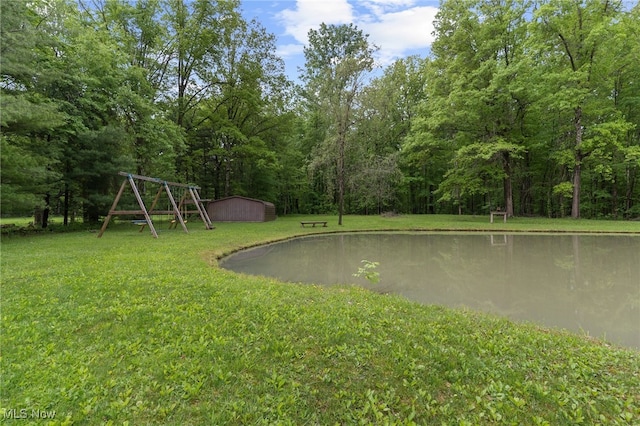 17801 Ellsworth Rd, Lake Milton, OH 44429 - view of green lawn featuring a playground and a wooded view