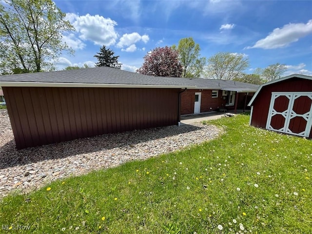 6391 Viking, East Canton, OH 44730 - back of house featuring a lawn and a patio