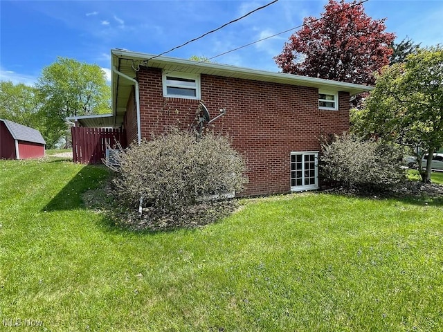 6391 Viking, East Canton, OH 44730 - back of property with a lawn and brick siding