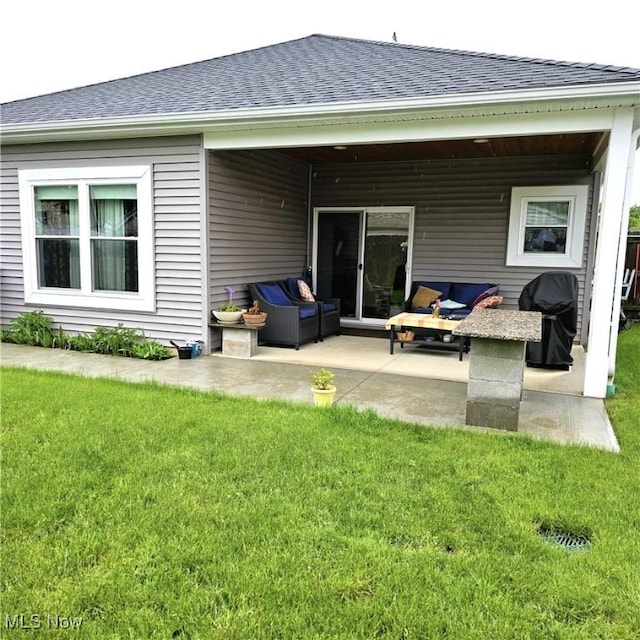 6363 Lockhaven Dr, Brook Park, OH 44142 - rear view of property with a patio area, a yard, and roof with shingles