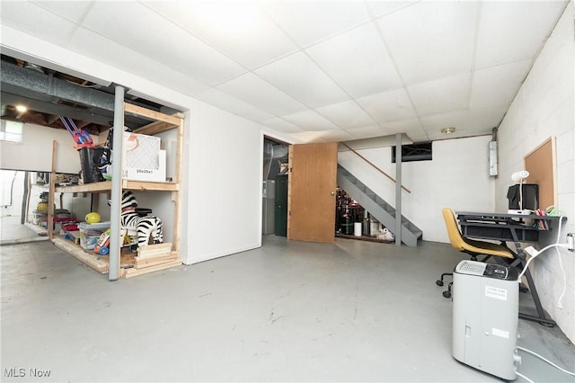 1087 Madrid Dr, Akron, OH 44313 - finished basement with stairs and a paneled ceiling