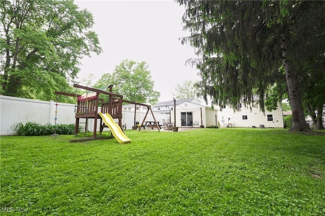 1087 Madrid Dr, Akron, OH 44313 - view of yard with a playground