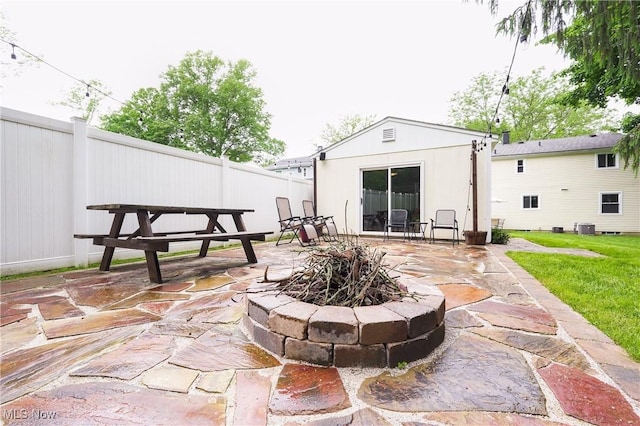 1087 Madrid Dr, Akron, OH 44313 - view of patio featuring central AC unit