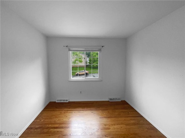 2330 Judy Dr, Parma, OH 44134 - empty room featuring wood finished floors and baseboards