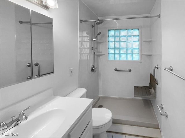 2330 Judy Dr, Parma, OH 44134 - bathroom with a shower, toilet, and vanity
