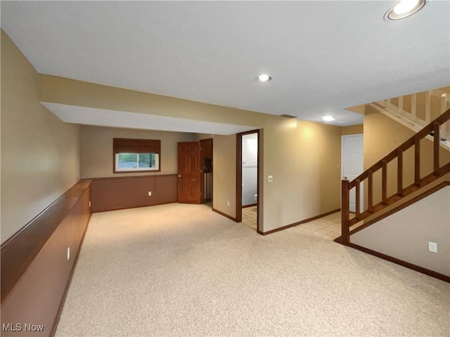 2330 Judy Dr, Parma, OH 44134 - below grade area with light colored carpet, baseboards, stairway, and recessed lighting