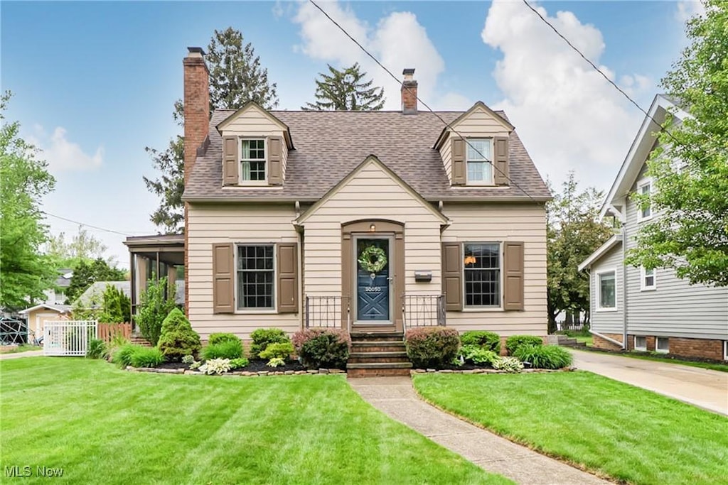 20050 Laverne Ave, Rocky River, OH 44116 - cape cod-style house with a chimney and roof with shingles