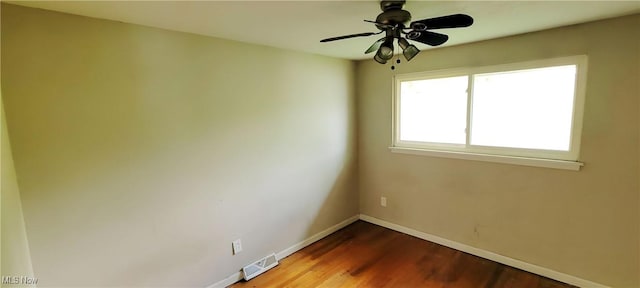 4321 W 181st St, Cleveland, OH 44135 - spare room with baseboards, wood finished floors, and a ceiling fan