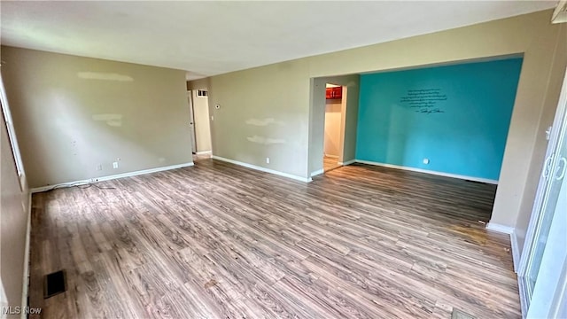 24 Washington Sq, Euclid, OH 44143 - empty room featuring wood finished floors and baseboards