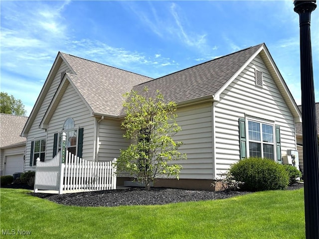 39 Village Ct, Columbiana, OH 44408 - view of property exterior featuring a shingled roof