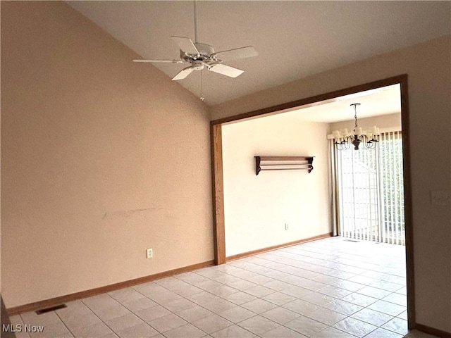 39 Village Ct, Columbiana, OH 44408 - empty room with a chandelier, a ceiling fan, lofted ceiling, baseboards, and light tile patterned floors