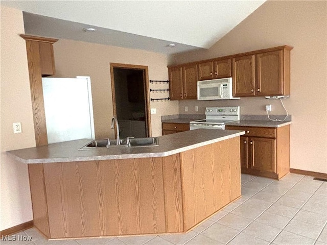 39 Village Ct, Columbiana, OH 44408 - kitchen with white appliances, a sink, light tile patterned flooring, baseboards, and brown cabinets
