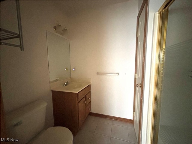39 Village Ct, Columbiana, OH 44408 - bathroom featuring vanity, toilet, tile patterned floors, and a shower with shower door