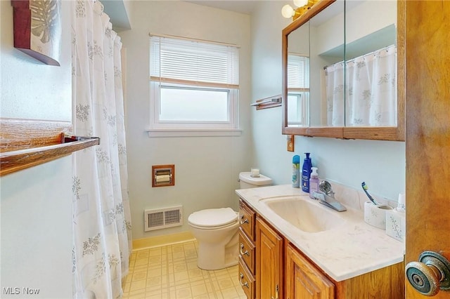 213 Pico St, Steubenville, OH 43952 - bathroom with vanity, toilet, and tile patterned floors