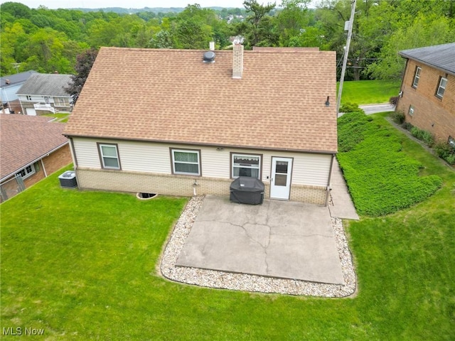 213 Pico St, Steubenville, OH 43952 - back of property with a patio, brick siding, a chimney, central air condition unit, and roof with shingles