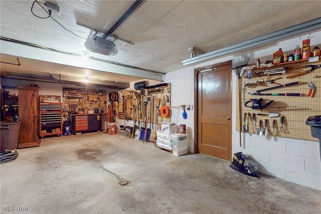 213 Pico St, Steubenville, OH 43952 - garage featuring a workshop area and a garage door opener