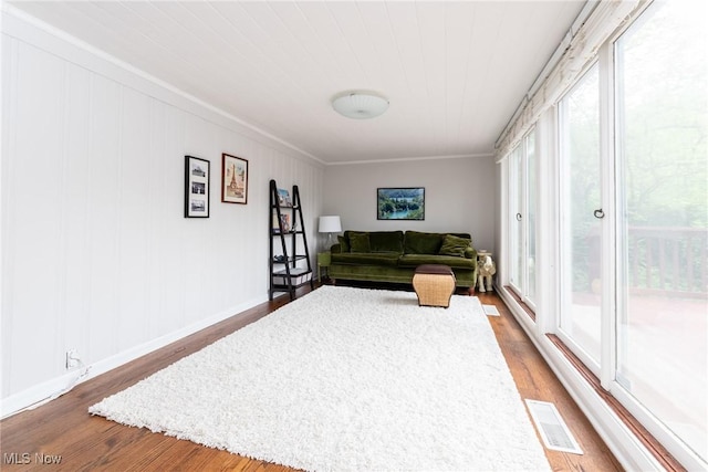 23935 Duffield Rd, Shaker Heights, OH 44122 - living area with wood finished floors, baseboards, and crown molding