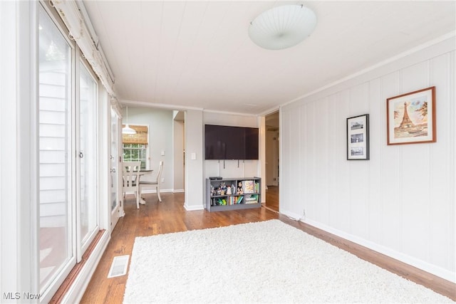 23935 Duffield Rd, Shaker Heights, OH 44122 - unfurnished living room with wood finished floors and baseboards