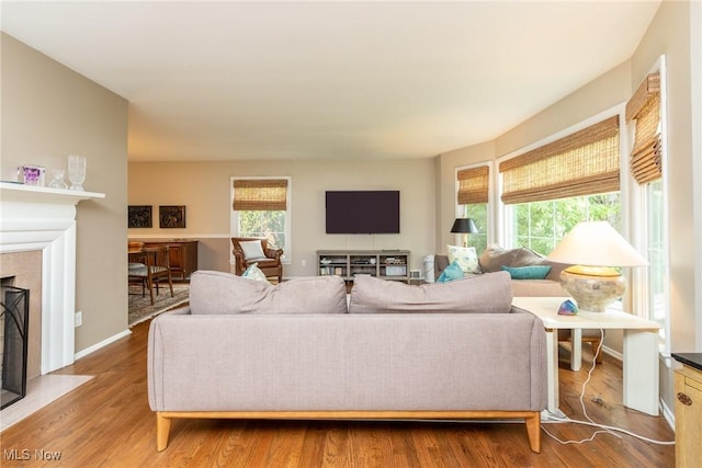 23935 Duffield Rd, Shaker Heights, OH 44122 - living area with a fireplace with flush hearth and wood finished floors