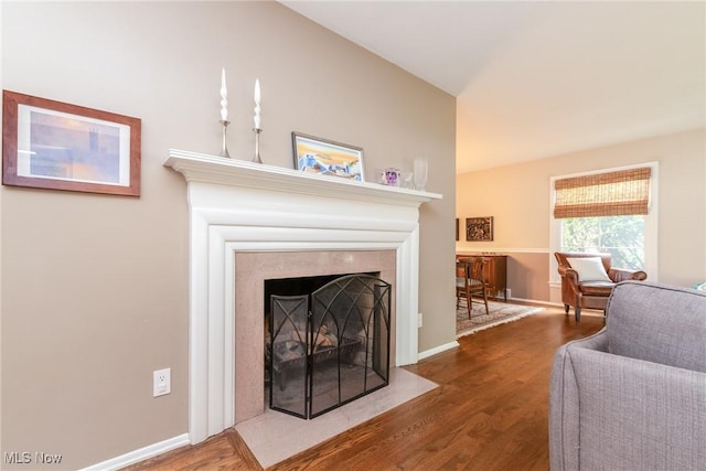 23935 Duffield Rd, Shaker Heights, OH 44122 - living area featuring wood finished floors, a fireplace with flush hearth, and baseboards