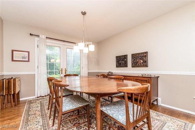 23935 Duffield Rd, Shaker Heights, OH 44122 - dining room featuring light wood-type flooring, baseboards, and french doors