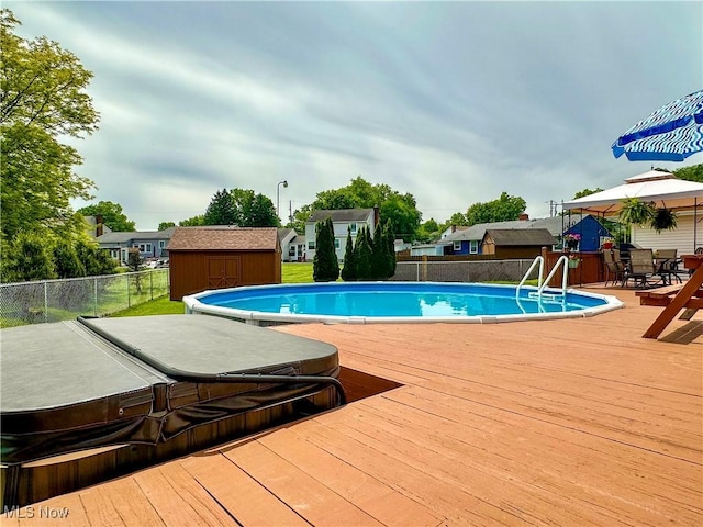 2308 Bears Den Rd, Youngstown, OH 44511 - view of pool with a covered hot tub, a wooden deck, a fenced backyard, and outdoor dining area