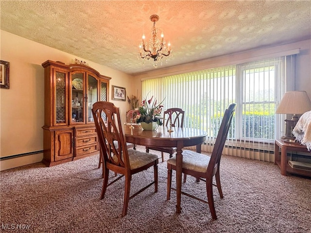 2308 Bears Den Rd, Youngstown, OH 44511 - carpeted dining area with a chandelier, a textured ceiling, and a baseboard radiator