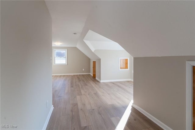4827 E 88th St, Garfield Heights, OH 44125 - bonus room with vaulted ceiling, light wood-style floors, and baseboards