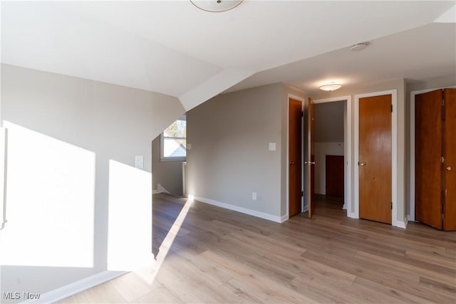 4827 E 88th St, Garfield Heights, OH 44125 - additional living space featuring light wood-type flooring and baseboards