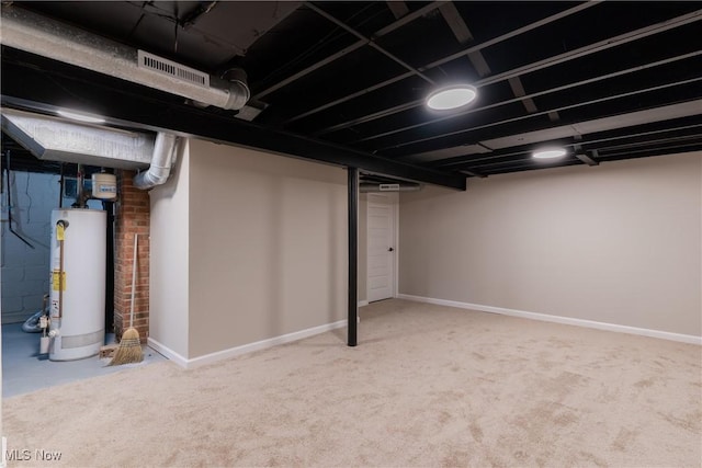 4827 E 88th St, Garfield Heights, OH 44125 - finished below grade area featuring water heater, baseboards, and carpet