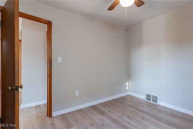 4827 E 88th St, Garfield Heights, OH 44125 - spare room featuring light wood-style flooring, ceiling fan, and baseboards