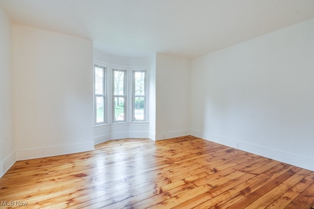 235 Elm St, Oberlin, OH 44074 - empty room with hardwood / wood-style floors and baseboards