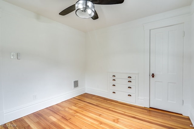 235 Elm St, Oberlin, OH 44074 - spare room with ceiling fan, light wood-type flooring, and baseboards