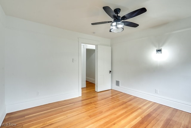 235 Elm St, Oberlin, OH 44074 - spare room featuring light wood-type flooring, baseboards, and ceiling fan