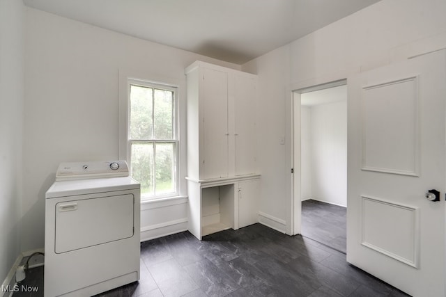 235 Elm St, Oberlin, OH 44074 - laundry room with washer / dryer, healthy amount of natural light, and baseboards