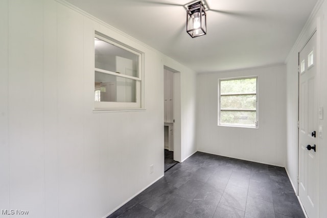 235 Elm St, Oberlin, OH 44074 - empty room with baseboards and crown molding